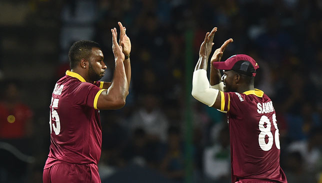 Pollard (l) and Sammy while playing for the West Indies.