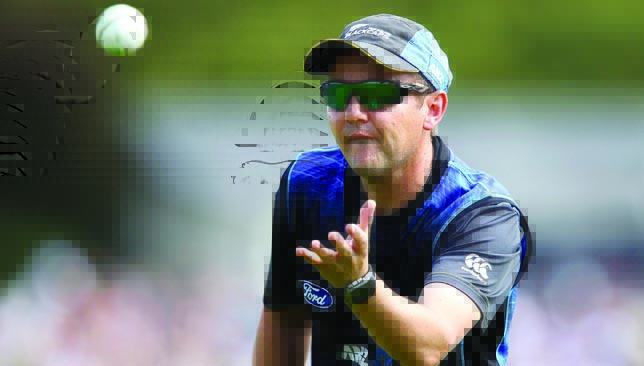 CHRISTCHURCH, NEW ZEALAND - DECEMBER 26: Coach Mike Hesson of New Zealand warms up with his players during the first One Day International match between New Zealand and Sri Lanka at Hagley Oval on December 26, 2015 in Christchurch, New Zealand. (Photo by Hagen Hopkins/Getty Images)