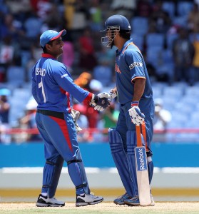 MS Dhoni shakes hands with his Afghan wicketkeeping counterpart