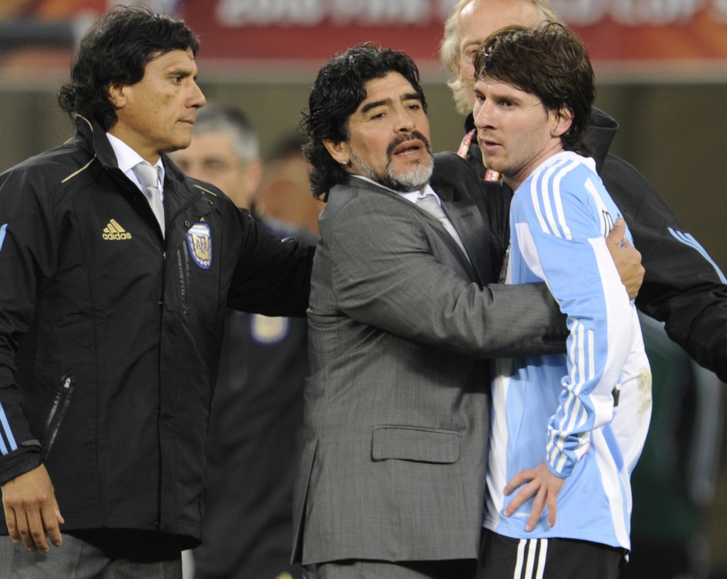 Argentina's coach Diego Maradona hugs Ar