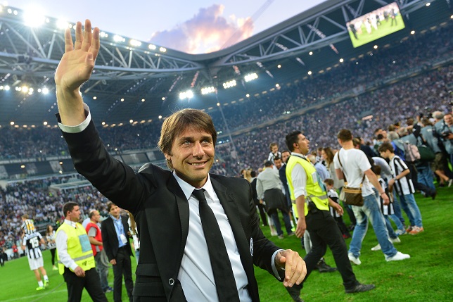 Antonio Conte celebrates his third successive Serie A title at Juventus.