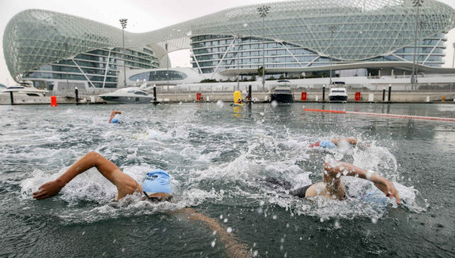 Swimmers go all out at Yas Marina as they compete in the swimming section of TriYAS by Daman s ActiveLife