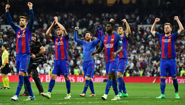 Barcelona players celebrate after beating Real Madrid.