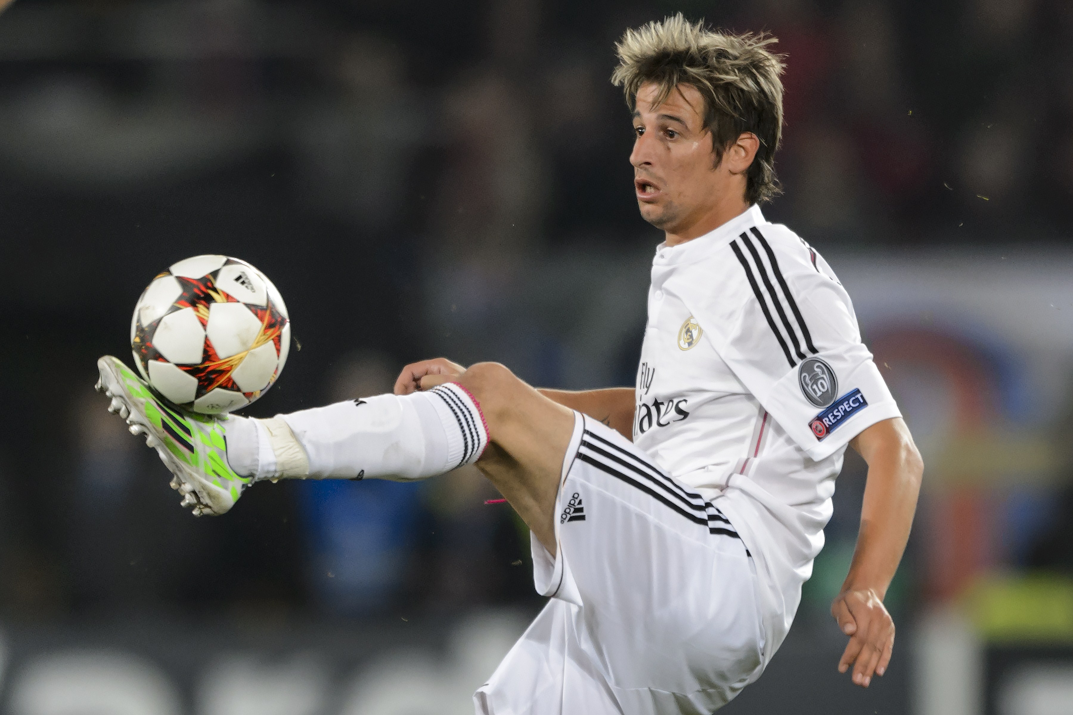 Real Madrid's Portuguese defender Fabio Coentrao controls the ball during the UEFA Champions League Group B football match between FC Basel and Real Madrid in Basel on November 26, 2014. AFP PHOTO / FABRICE COFFRINI (Photo credit should read FABRICE COFFRINI/AFP/Getty Images)
