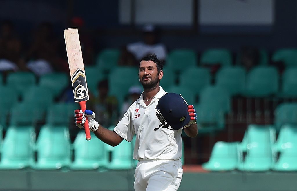 Pujara celebrates his match-winning century in the deciding Test