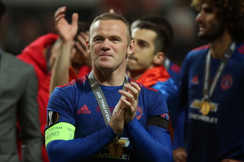 Manchester United's English striker Wayne Rooney celebrates after the UEFA Europa League final football match Ajax Amsterdam v Manchester United on May 24, 2017 at the Friends Arena in Solna outside Stockholm. / AFP PHOTO / Soren Andersson (Photo credit should read SOREN ANDERSSON/AFP/Getty Images)