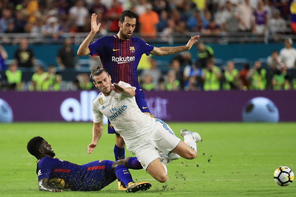 MIAMI GARDENS, FL - JULY 29: Samuel Umtiti #23 of Barcelona defends against Gareth Bale #11 of Real Madrid in the first half during their International Champions Cup 2017 match at Hard Rock Stadium on July 29, 2017 in Miami Gardens, Florida. (Photo by Mike Ehrmann/Getty Images)