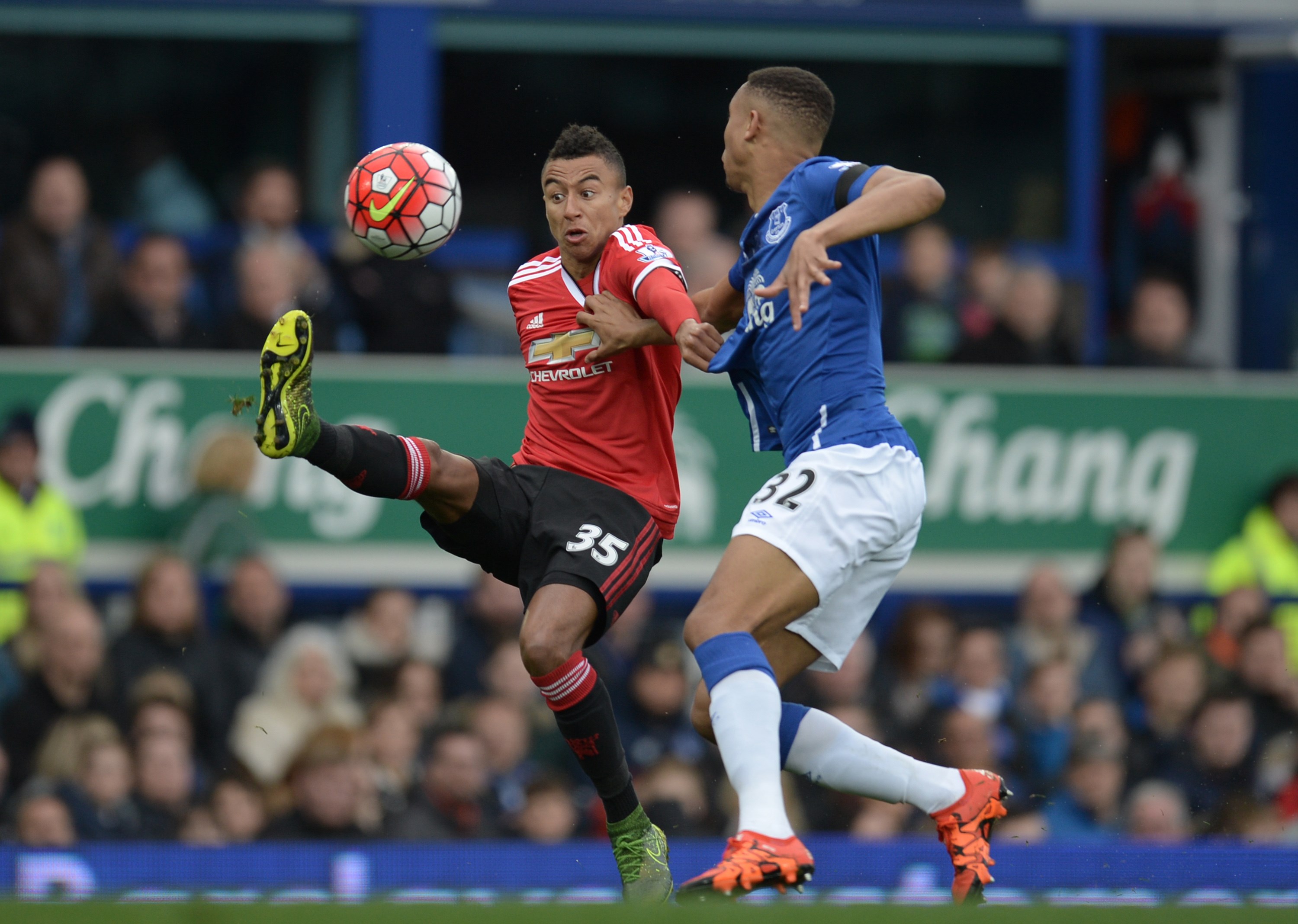 Manchester United's English midfielder Jesse Lingard (L) vies with Everton's Zimbabwean midfielder Brendan Galloway during the English Premier League football match between Everton and Manchester United at Goodison Park in Liverpool, north-west England, on October 17, 2015. AFP PHOTO / OLI SCARFF RESTRICTED TO EDITORIAL USE. No use with unauthorized audio, video, data, fixture lists, club/league logos or 'live' services. Online in-match use limited to 75 images, no video emulation. No use in betting, games or single club/league/player publications. (Photo credit should read OLI SCARFF/AFP/Getty Images)