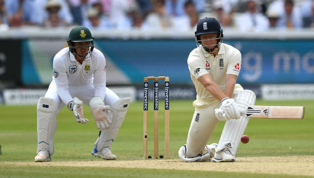 Jonny Bairstow plays a reverse sweep as Quinton de Kock watches on.