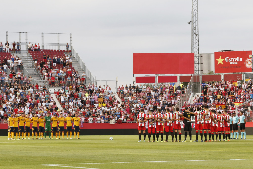 Atletico Madrid's and Girona's players observe a minute's silence on Saturday for the victims of the Barcelona terror attack.