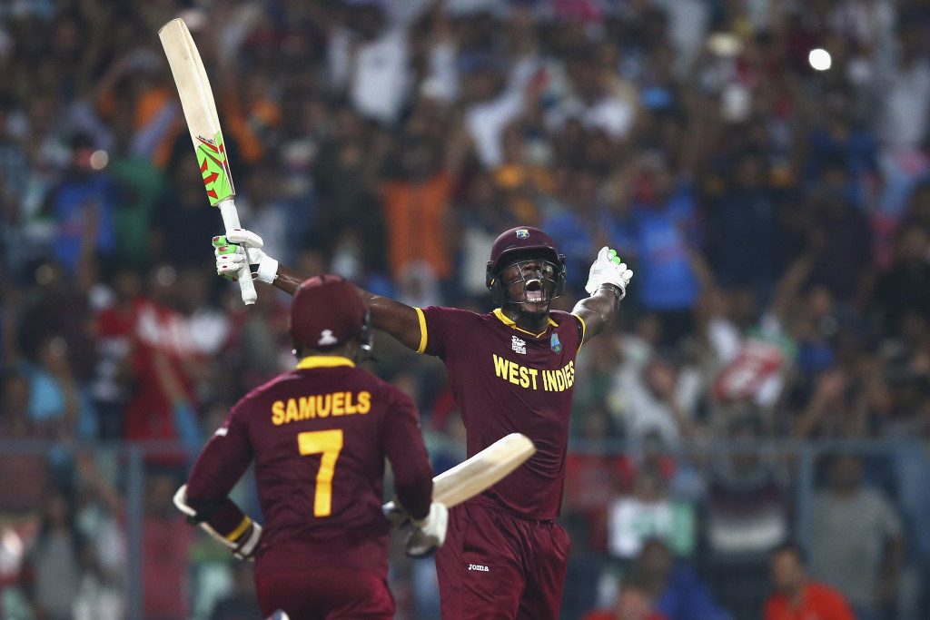KOLKATA, WEST BENGAL - APRIL 03: Carlos Brathwaite of the West Indies celebrates hitting the winning runs during the ICC World Twenty20 India 2016 Final match between England and West Indies at Eden Gardens on April 3, 2016 in Kolkata, India. (Photo by Ryan Pierse/Getty Images)