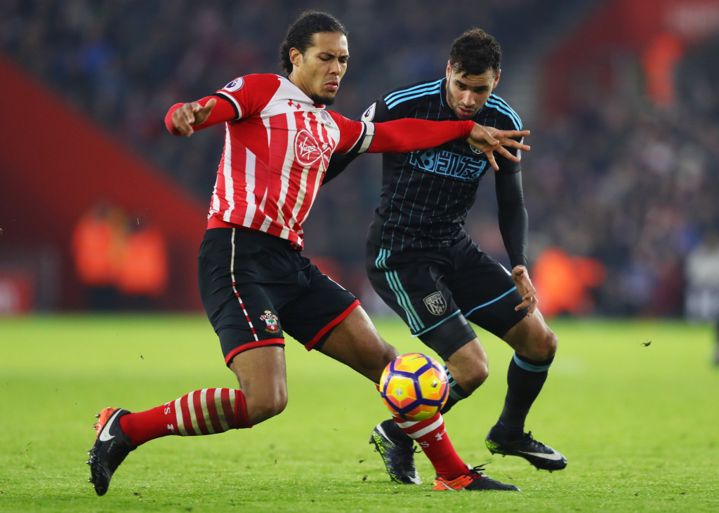 SOUTHAMPTON, ENGLAND - DECEMBER 31: Virgil van Dijk of Southampton and Hal Robson-Kanu of West Bromwich Albion compete for the ball during the Premier League match between Southampton and West Bromwich Albion at St Mary's Stadium on December 31, 2016 in Southampton, England. (Photo by Warren Little/Getty Images)