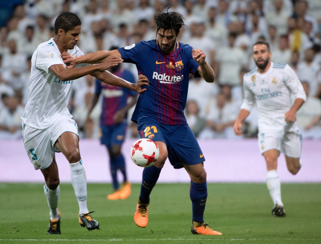 Varane battles for the ball with Gomes