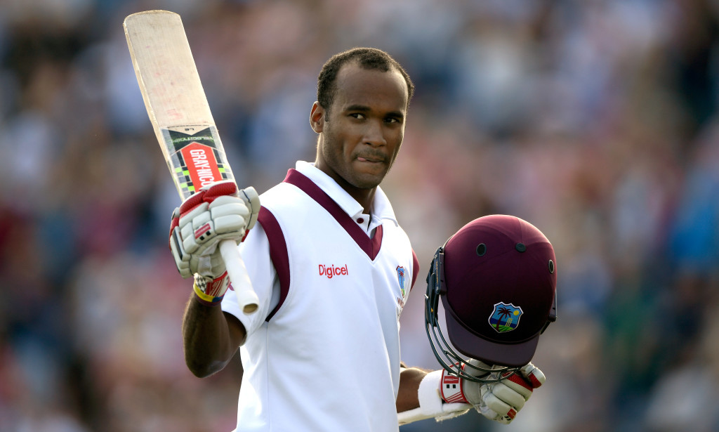 LEEDS, ENGLAND - AUGUST 26: West Indies batsman Kraigg Brathwaite raises his bat as he leaves the field after being dismissed for 134 runs during day two of the 2nd Investec Test match between England and West Indies at Headingley on August 26, 2017 in Leeds, England. (Photo by Stu Forster/Getty Images)
