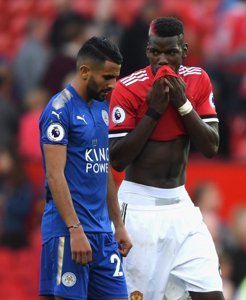 MANCHESTER, ENGLAND - AUGUST 26: Riyad Mahrez of Leicester City speaks with Paul Pogba of Manchester United following the Premier League match between Manchester United and Leicester City at Old Trafford on August 26, 2017 in Manchester, England. (Photo by Ross Kinnaird/Getty Images)