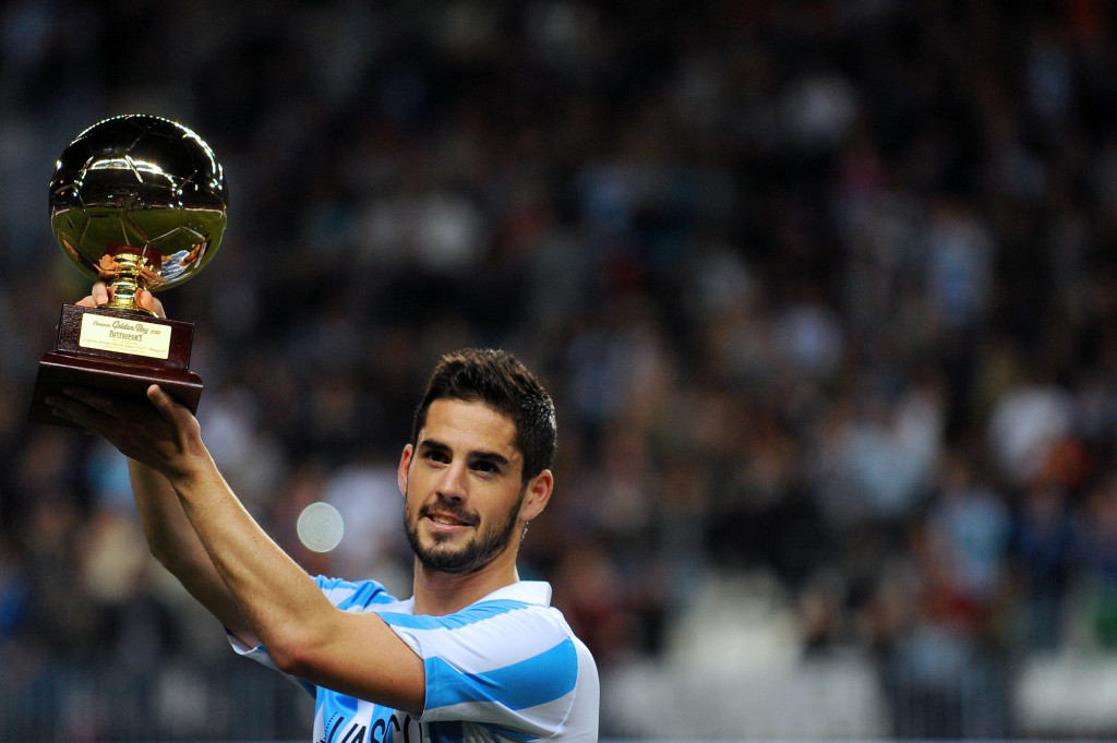 Isco holds his Golden Boy trophy during his time with Malaga in 2012