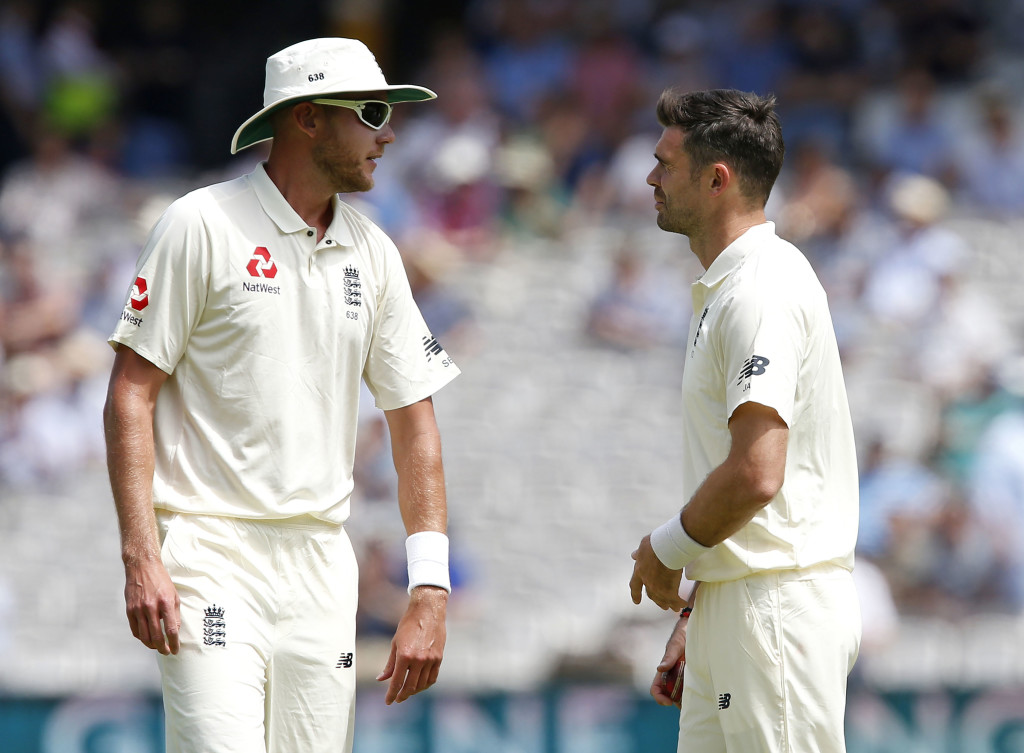 Englands Stuart Broad speaks to Englands James Anderson on the second day of the first Test match between England and South Africa at Lord's Cricket Ground in central London on July 7, 2017. / AFP PHOTO / Ian KINGTON (Photo credit should read IAN KINGTON/AFP/Getty Images)