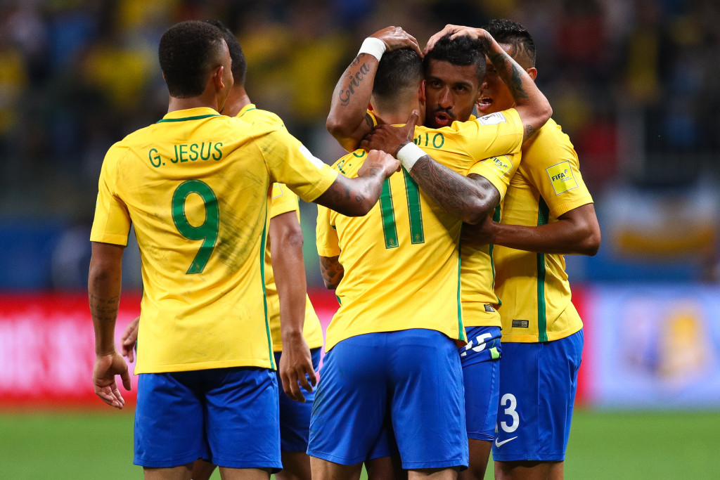 PORTO ALEGRE, BRAZIL - AUGUST 31: (L-R) Gabriel Jesus, Philippe Coutinho and Paulinho of Brazil celebrate a scored goal against Ecuador during a match between Brazil and Ecuador as part of 2018 FIFA World Cup Russia Qualifier at Arena do Gremio on August 31, 2017 in Porto Alegre, Brazil. (Photo by Buda Mendes/Getty Images)
