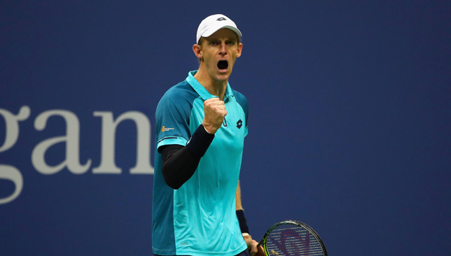 Kevin Anderson celebrates after beating Pablo Carreno Busta.