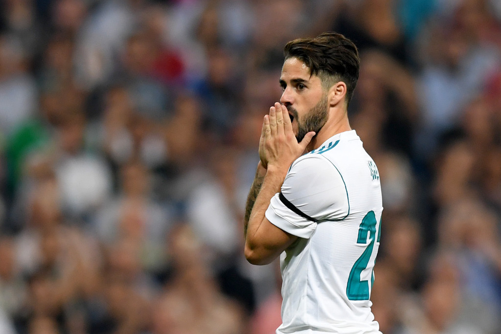Real Madrid's midfielder Isco reacts during the Spanish league football match Real Madrid CF against Real Betis at the Santiago Bernabeu stadium in Madrid on September 20, 2017. / AFP PHOTO / GABRIEL BOUYS (Photo credit should read GABRIEL BOUYS/AFP/Getty Images)