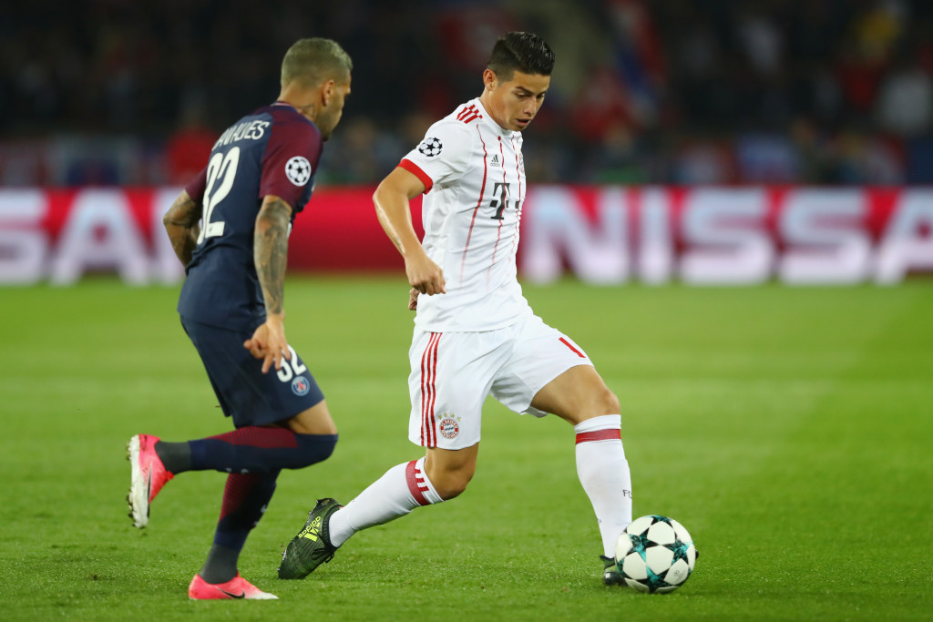 Alves watches Rodriguez carefully