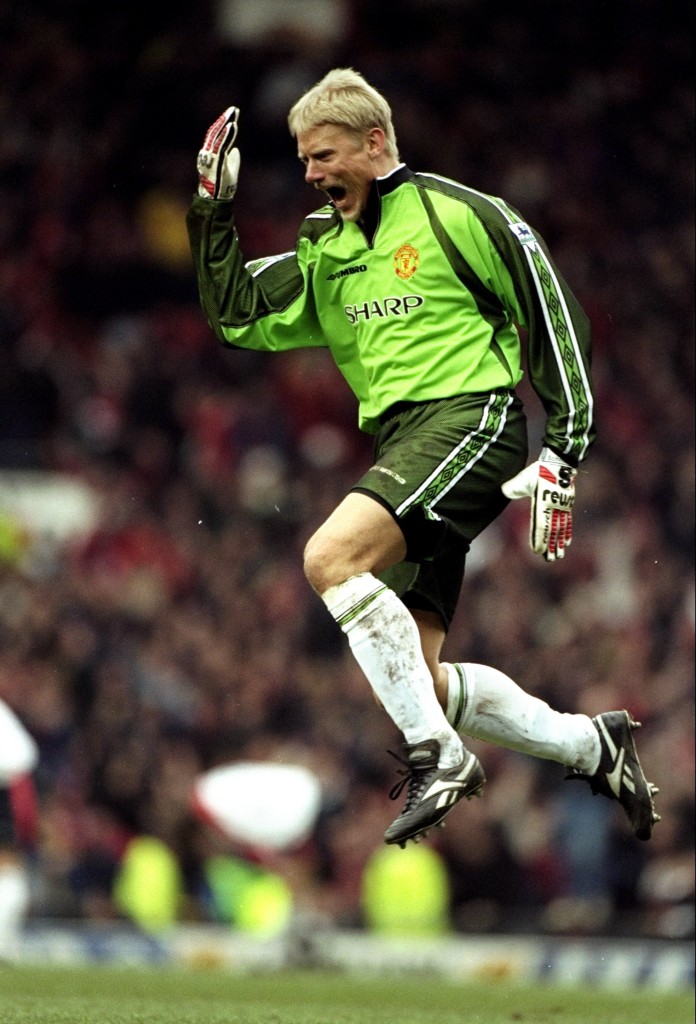 24 Jan 1999: Manchester United keeper Peter Schmeichel celebrates during the FA Cup fourth round clash against Liverpool at Old Trafford in Manchester, England. United won 2-1. Mandatory Credit: Ross Kinnaird /Allsport