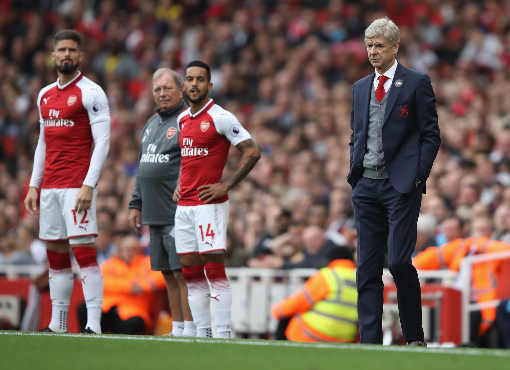 LONDON, ENGLAND - OCTOBER 01: Arsene Wenger manager of Arsenal looks on as Olivier Giroud and Theo Walcott of Arsenal prepare to come on during the Premier League match between Arsenal and Brighton and Hove Albion at Emirates Stadium on October 1, 2017 in London, England. (Photo by Julian Finney/Getty Images)