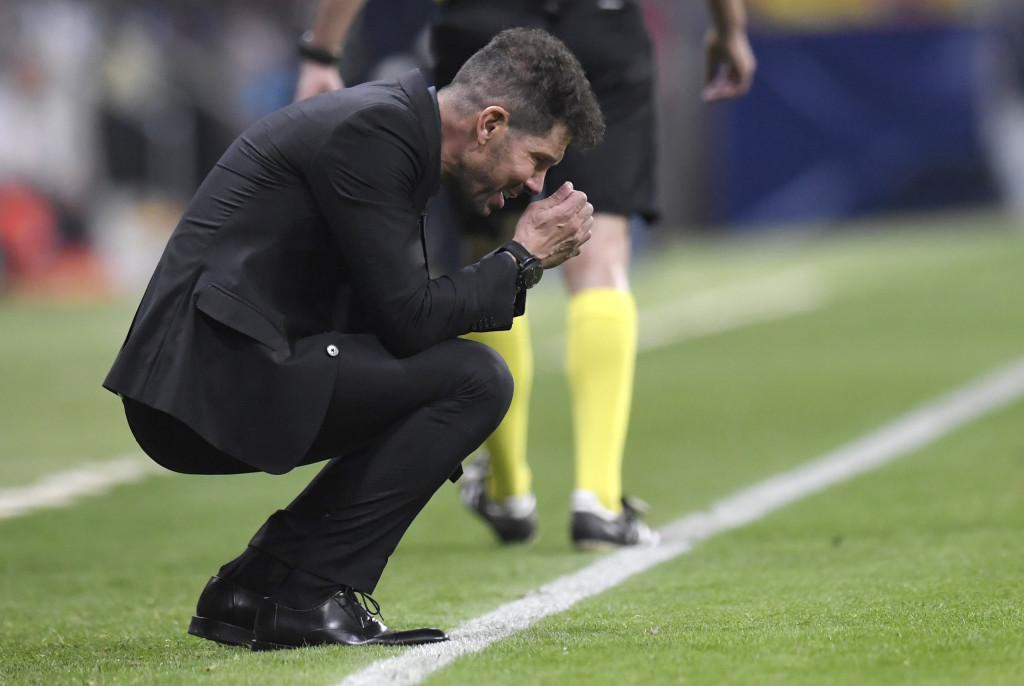 Simeone reacts during the 1-1 draw with Barca
