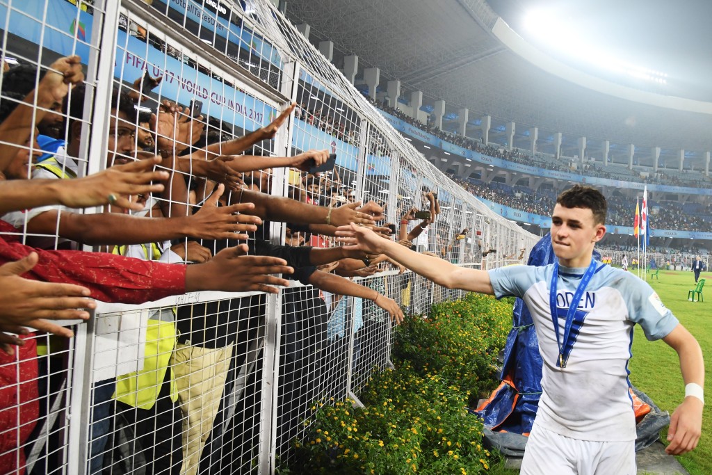 England midfielder Phil Foden greets spectators after win over Spain