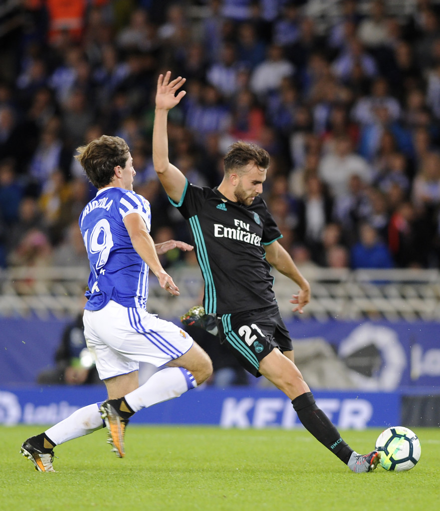 Real Madrid's forward from Spain Borja Mayoral (R) vies with Real Sociedad's defender from Spain Alvaro Odriozola during the Spanish league football match Real Sociedad vs Real Madrid CF at the Anoeta stadium in San Sebastian on September 17, 2017. / AFP PHOTO / ANDER GILLENEA (Photo credit should read ANDER GILLENEA/AFP/Getty Images)