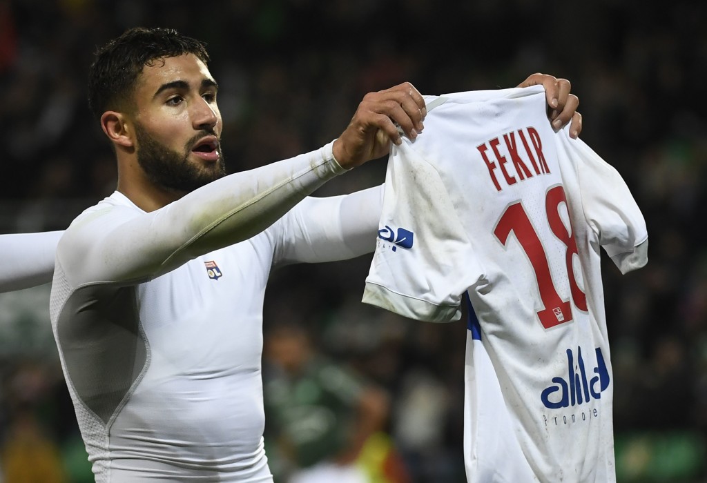 Lyon's French midfielder Nabil Fekir shows his shirt after scoring during the French L1 football match between AS Saint-Etienne and Olympique Lyonnais, on November 5, 2017, at the Geoffroy Guichard stadium in Saint-Etienne, central France. / AFP PHOTO / PHILIPPE DESMAZES (Photo credit should read PHILIPPE DESMAZES/AFP/Getty Images)