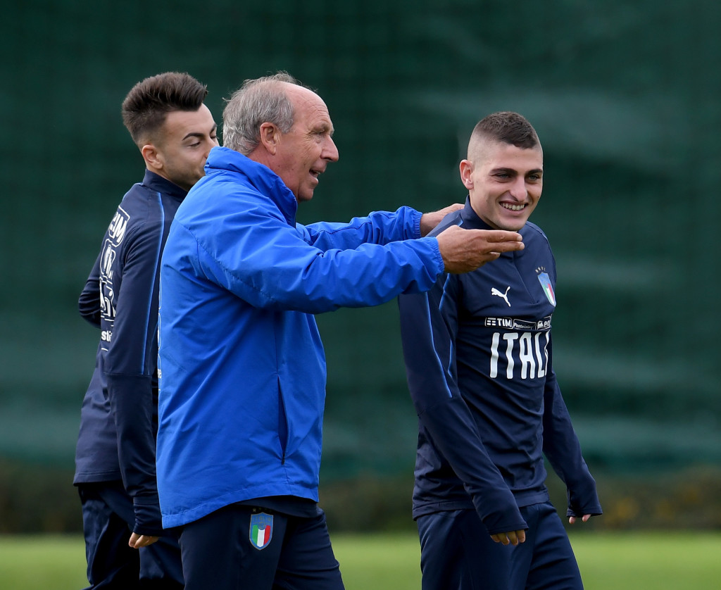 Italy coach Gian Piero Ventura (L) and Marco Verratti chat during training 
