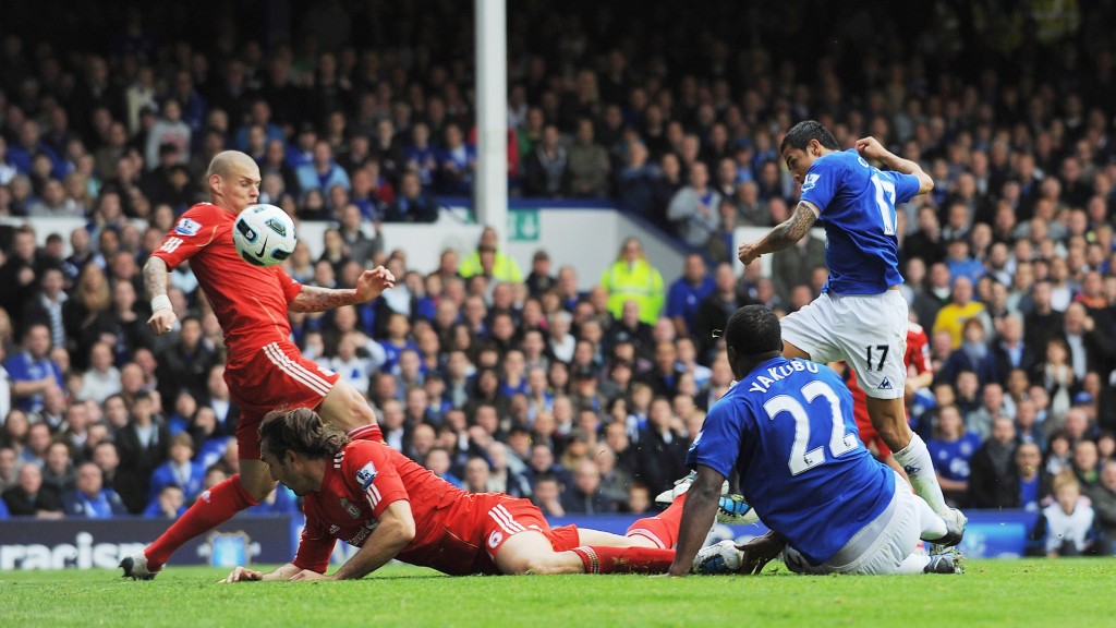 LIVERPOOL, ENGLAND - OCTOBER 17: Tim Cahill (R) of Everton scores the opening goal during the Barclays Premier League match between Everton and Liverpool at Goodison Park on October 17, 2010 in Liverpool, England. (Photo by Michael Regan/Getty Images)
