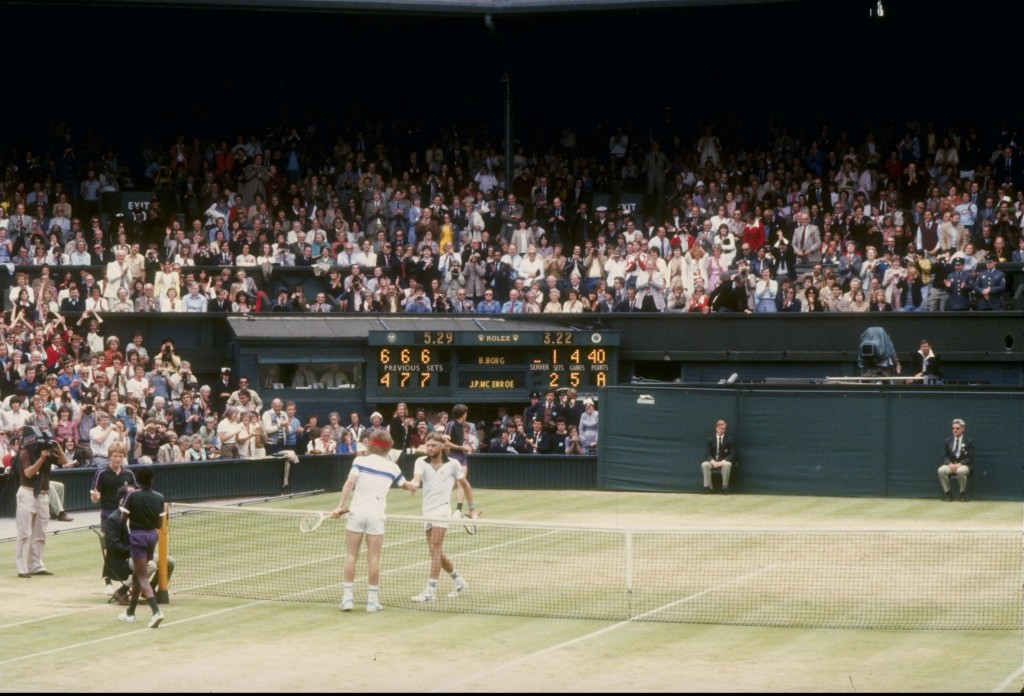 Bjorn Borg and John McEnroe shake hands after a match at Wimbledon in England.