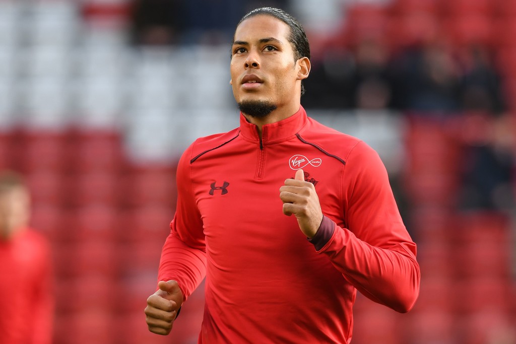 Southampton's Dutch defender Virgil van Dijk warms up ahead of  the English Premier League football match between Liverpool and Southampton at Anfield in Liverpool, north west England on November 18, 2017. / AFP PHOTO / Paul ELLIS / RESTRICTED TO EDITORIAL USE. No use with unauthorized audio, video, data, fixture lists, club/league logos or 'live' services. Online in-match use limited to 75 images, no video emulation. No use in betting, games or single club/league/player publications.  /         (Photo credit should read PAUL ELLIS/AFP/Getty Images)