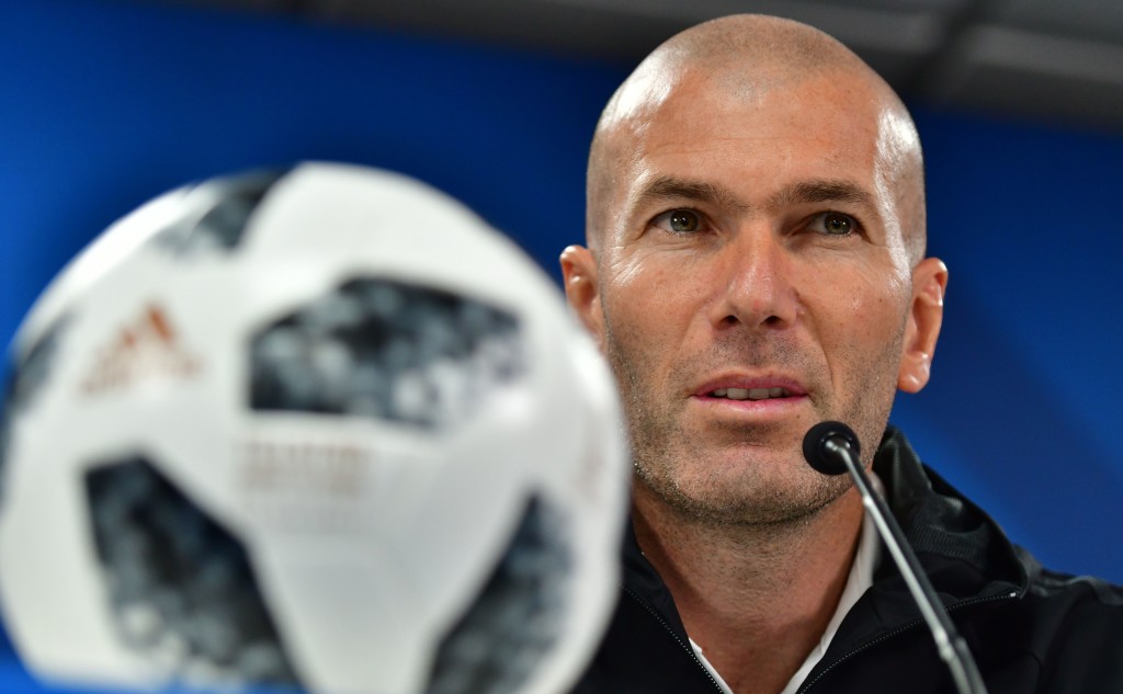 Real Madrid coach Zinedine Zidane speaks during a press conference on the eve of their FIFA Club World Cup final match against Brazilian Gremio club in the Emirati capital Abu Dhabi on December 15, 2017. / AFP PHOTO / Giuseppe CACACE (Photo credit should read GIUSEPPE CACACE/AFP/Getty Images)