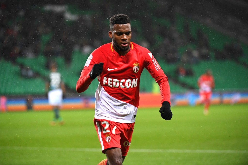 Monacos French midfielder Thomas Lemar (C) celebrates after scoring a goal during the French L1 football match between Saint-Etienne (ASSE) and Monaco (ASM) on December 15, 2017, at the Geoffroy Guichard stadium in Saint-Etienne, central-eastern France. / AFP PHOTO / ROMAIN LAFABREGUE (Photo credit should read ROMAIN LAFABREGUE/AFP/Getty Images)
