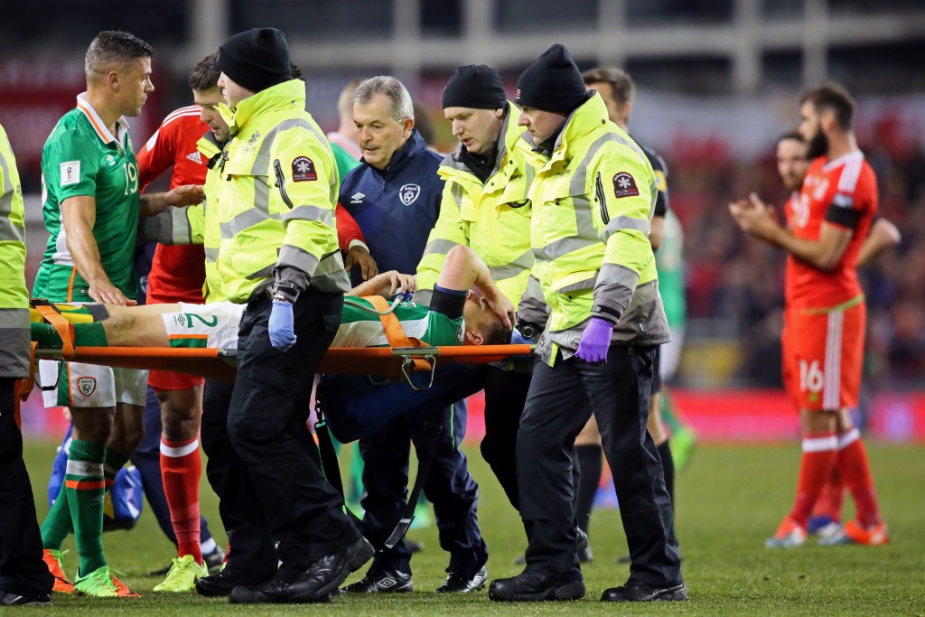 Republic of Ireland's defender Seamus Coleman is taken from the pitch on a stretcher after being injured during the World Cup 2018 qualification football match between Republic of Ireland and Wales at Aviva Stadium in Dublin, Ireland on March 24, 2017. The game ended 0-0. / AFP PHOTO / Paul FAITH (Photo credit should read PAUL FAITH/AFP/Getty Images)