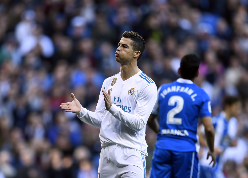 Real Madrid's Portuguese forward Cristiano Ronaldo reacts during the Spanish league football match between Real Madrid CF and RC Deportivo de la Coruna at the Santiago Bernabeu stadium in Madrid on January 21, 2018. / AFP PHOTO / OSCAR DEL POZO (Photo credit should read OSCAR DEL POZO/AFP/Getty Images)