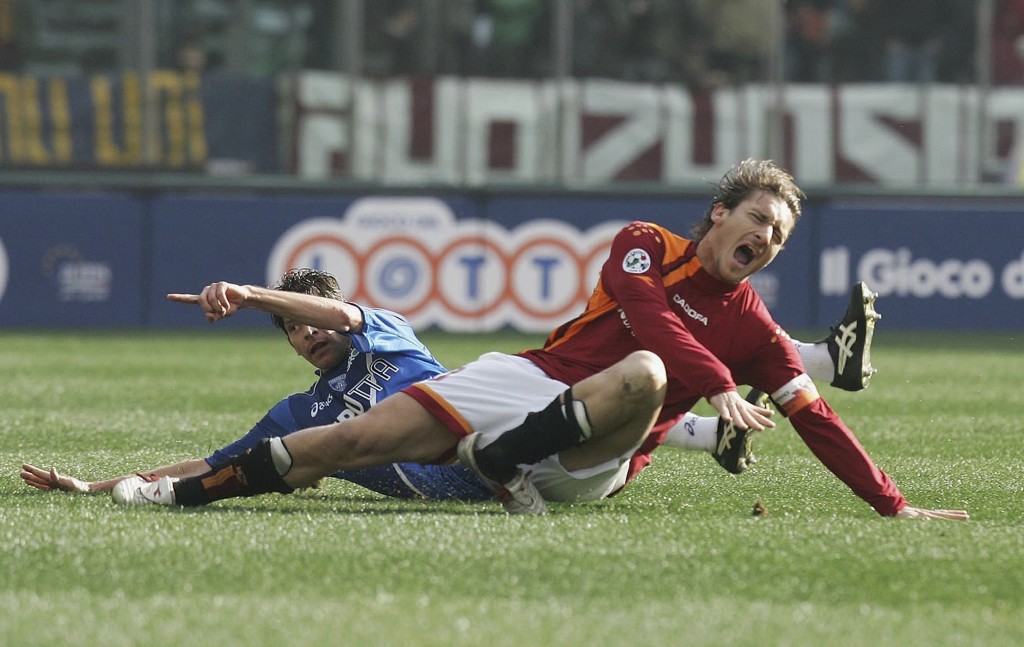 ROME, ITALY - FEBRUARY 19: Francesco Totti of Roma sustains an injury in action during the Serie A match between AS Roma and Empoli at the Stadio Olimpico on February 19, 2005 in Rome, Italy. (Photo by New Press/Getty Images)