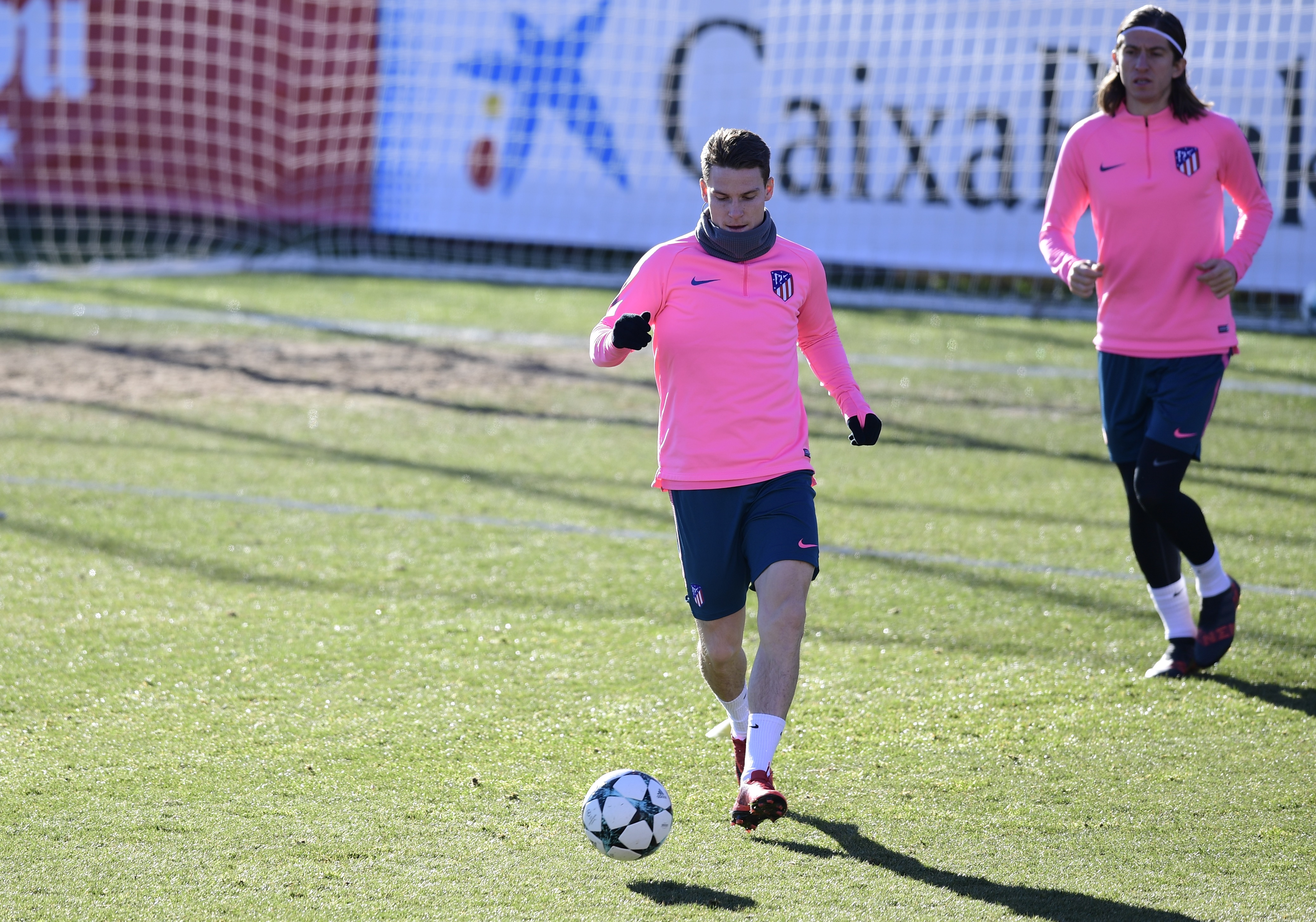 Atletico Madrid's French forward Kevin Gameiro (l) in training.