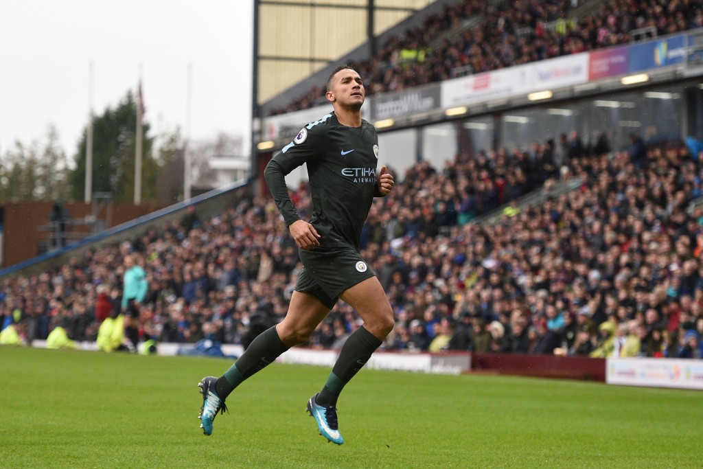 Manchester City's Brazilian defender Danilo celebrates scoring the opening goal during the English Premier League football match between Burnley and Manchester City at Turf Moor in Burnley, north west England on February 3, 2018. / AFP PHOTO / Oli SCARFF / RESTRICTED TO EDITORIAL USE. No use with unauthorized audio, video, data, fixture lists, club/league logos or 'live' services. Online in-match use limited to 75 images, no video emulation. No use in betting, games or single club/league/player publications. / (Photo credit should read OLI SCARFF/AFP/Getty Images)
