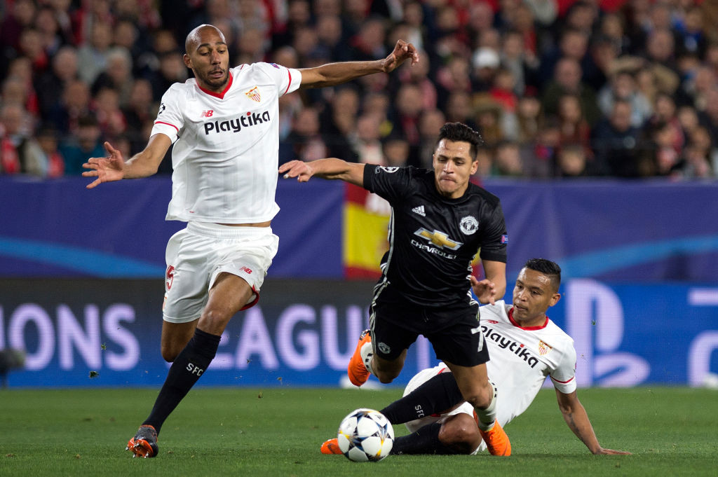 Steven N'Zonzi battles for the ball with Alexis Sanchez