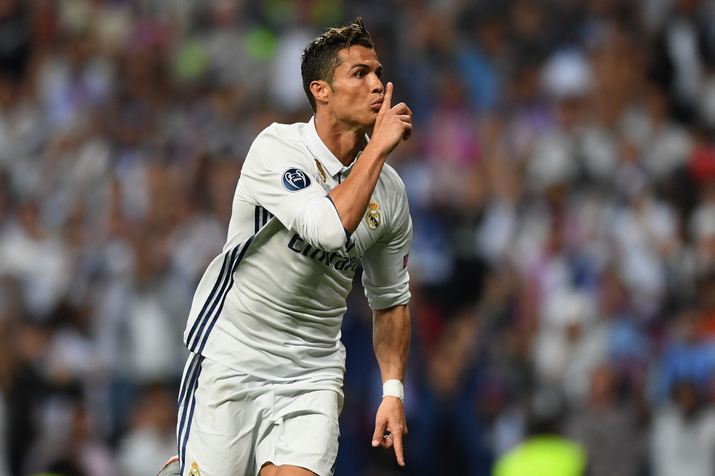 MADRID, SPAIN - APRIL 18: Cristiano Ronaldo of Real Madrid celebrates scoring his sides first goal during the UEFA Champions League Quarter Final second leg match between Real Madrid CF and FC Bayern Muenchen at Estadio Santiago Bernabeu on April 18, 2017 in Madrid, Spain. (Photo by Shaun Botterill/Getty Images)