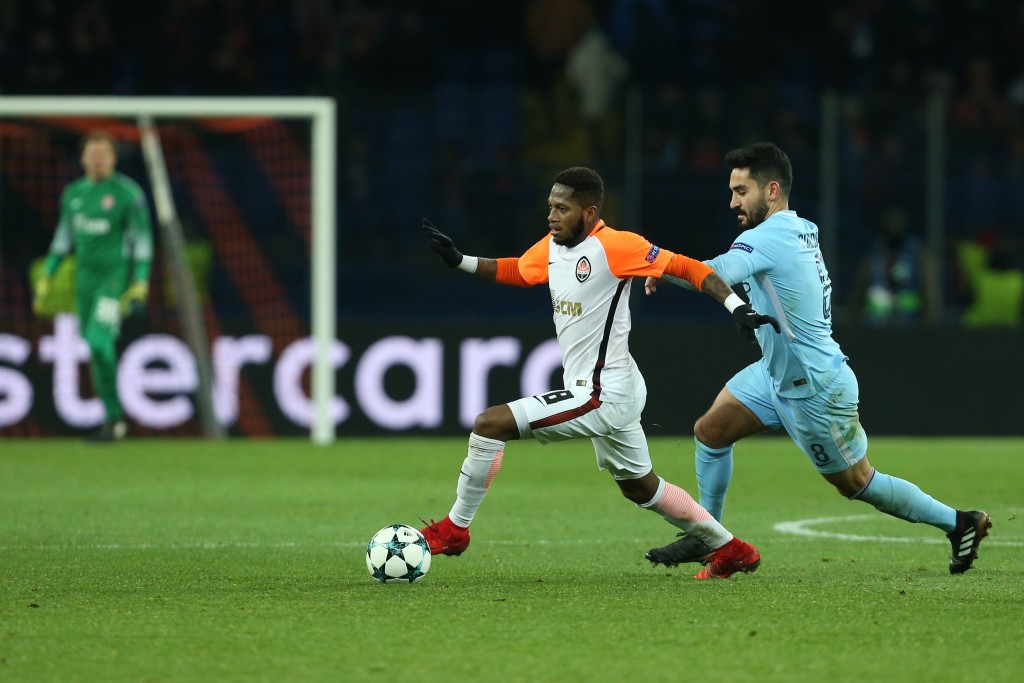 Shakhtar Donetsk's Brazilian midfielder Fred drives the ball ahead of Manchester City's German midfielder Ilkay Gundogan (R) during the UEFA Champions League group F football match between Shakhtar Donetsk and Manchester City, on December 6, 2017, at the Metalist stadium in Kharkiv, Eastern Ukraine. / AFP PHOTO / Stanislas VEDMID (Photo credit should read STANISLAS VEDMID/AFP/Getty Images)