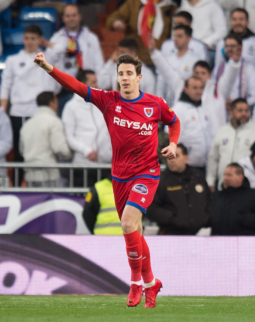 MADRID, SPAIN - JANUARY 10: Guillermo Fernandez of Numancia celebrates after scoring his team's opening goal during the Copa del Rey, round of 16, second leg match between between Real Madrid and Numancia at estadio Santiago Bernabeu on January 10, 2018 in Madrid, Spain. (Photo by Denis Doyle/Getty Images)