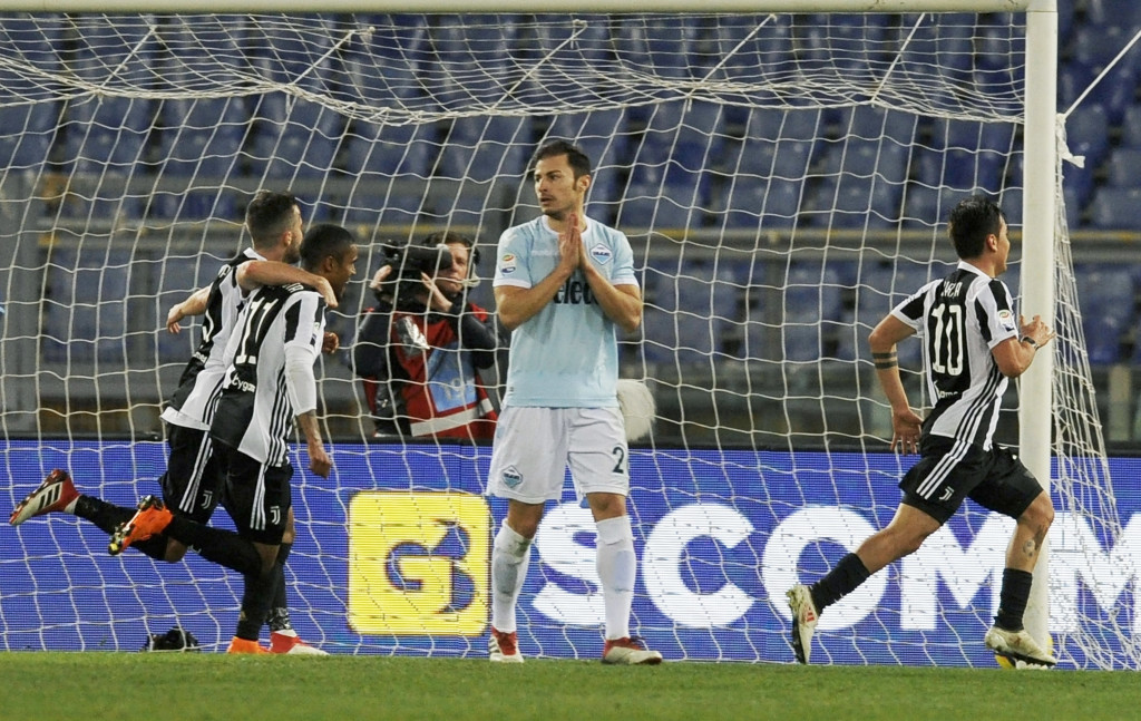 Paulo Dybala (r) forced an incredible late winner for Juventus at Lazio.