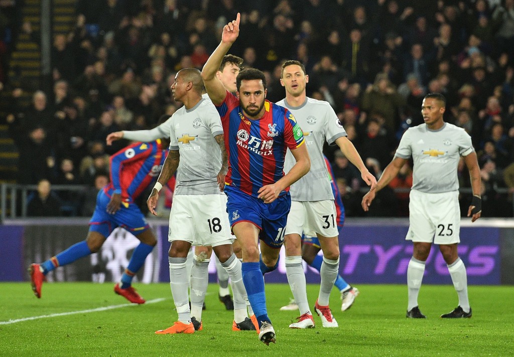 Crystal Palace winger Andros Townsend (c) celebrates his deflected opener.