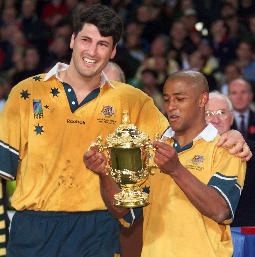 John Eales and George Gregan lift the trophy in 1999.