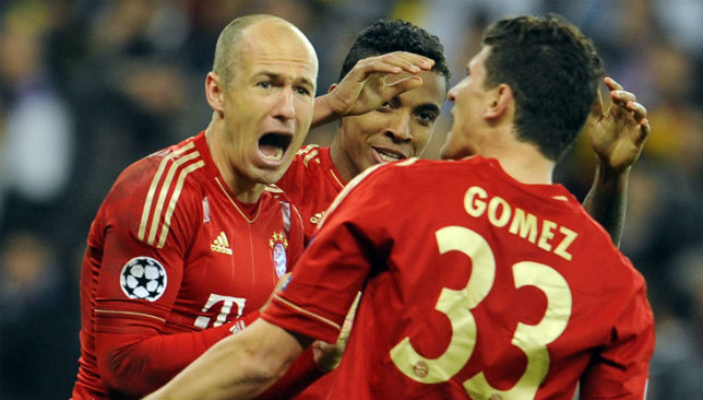 Arjen Robben celebrates with his team mates.